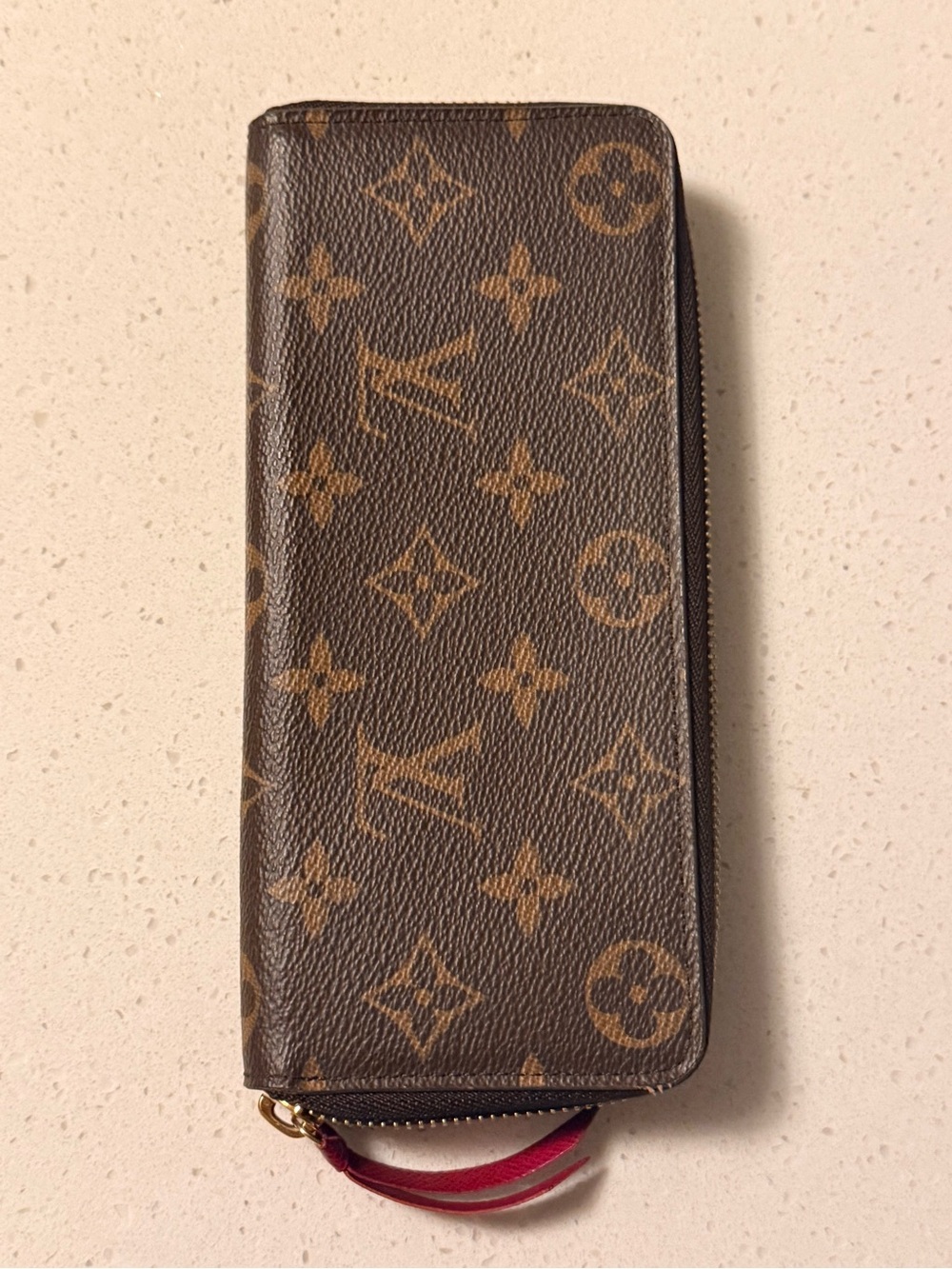 New (no tags) Louis Vuitton Monogram Zip Wallet in Brown and Tan with Red Pull.